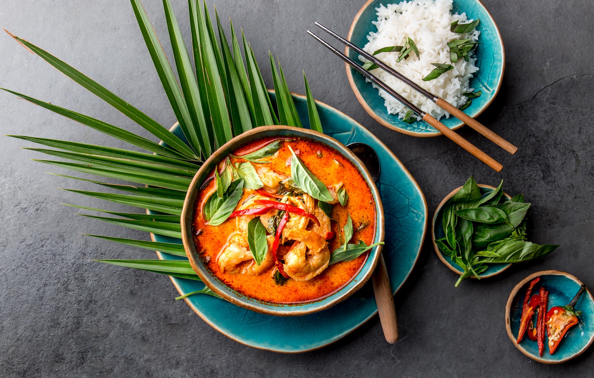 THAI SHRIMPS RED CURRY. Thailand Thai tradition red curry soup with shrimps prawns and coconut milk
